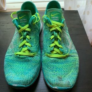 Green and gold Nike Shoes